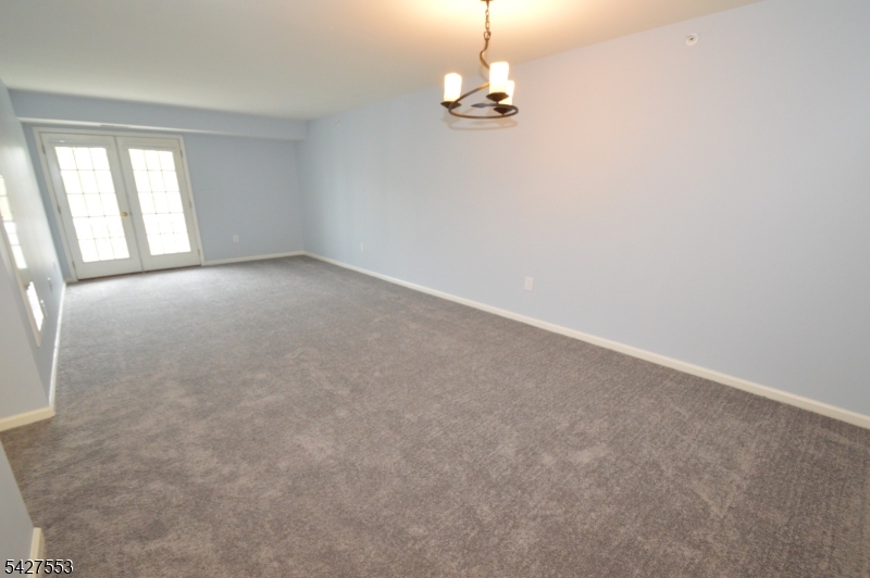 1 Jenny Lind Street, Unit 29 Netcong, NJ 07857 - Photo 2 of 13 a view of empty room with windows