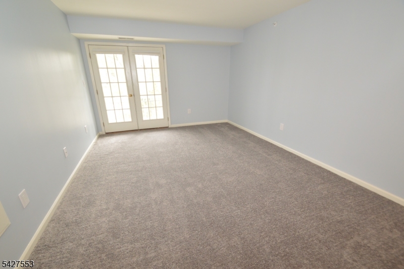 1 Jenny Lind Street, Unit 29 Netcong, NJ 07857 - Photo 7 of 13 an empty room with a window