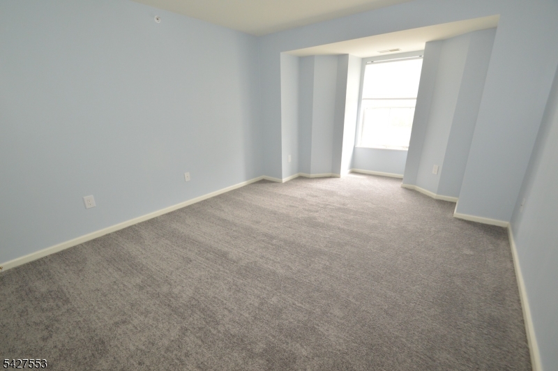 1 Jenny Lind Street, Unit 29 Netcong, NJ 07857 - Photo 10 of 13 an empty room with windows