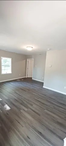 a kitchen with stainless steel appliances granite countertop a sink and a stove