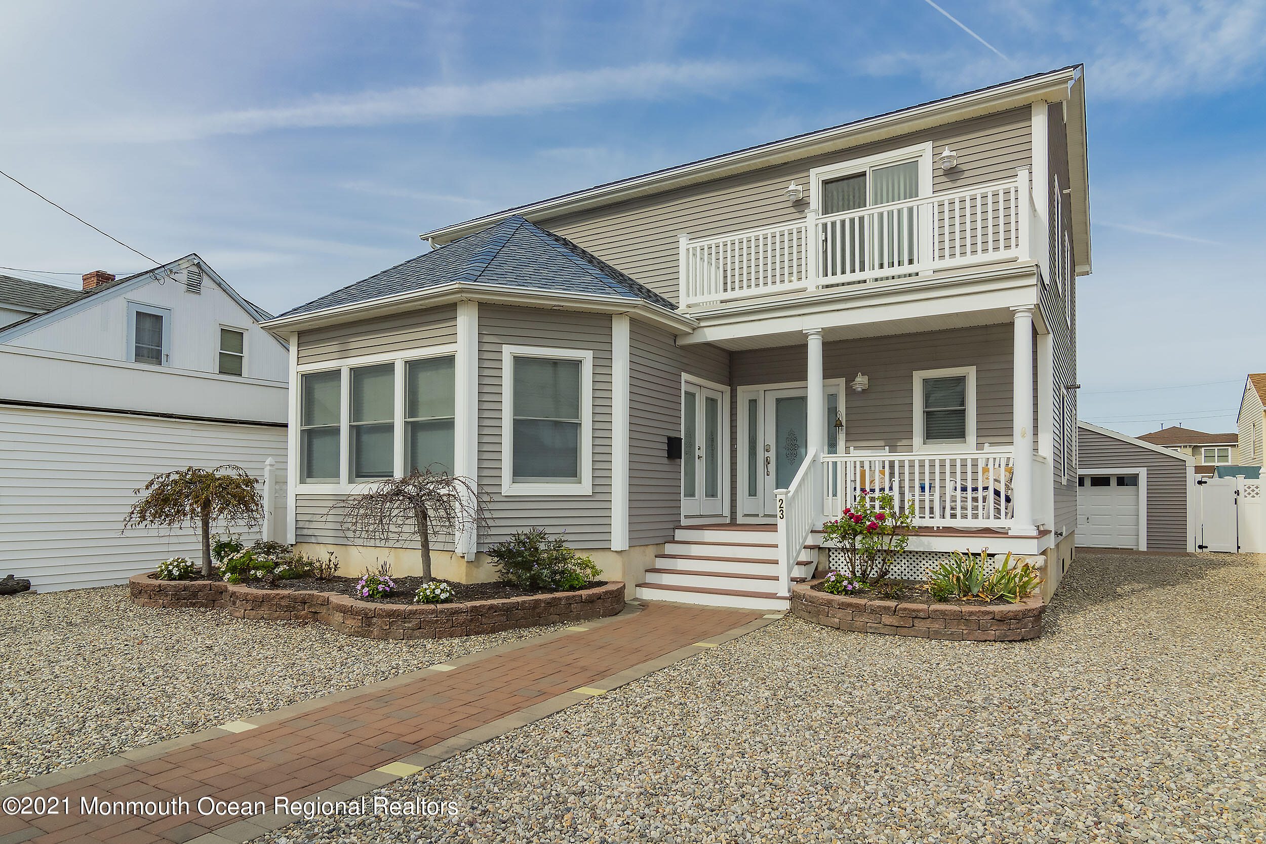 23 Magee Avenue, Unit SUMMER Lavallette, NJ 08735 - Photo 2 of 34 a front view of a house with sitting area