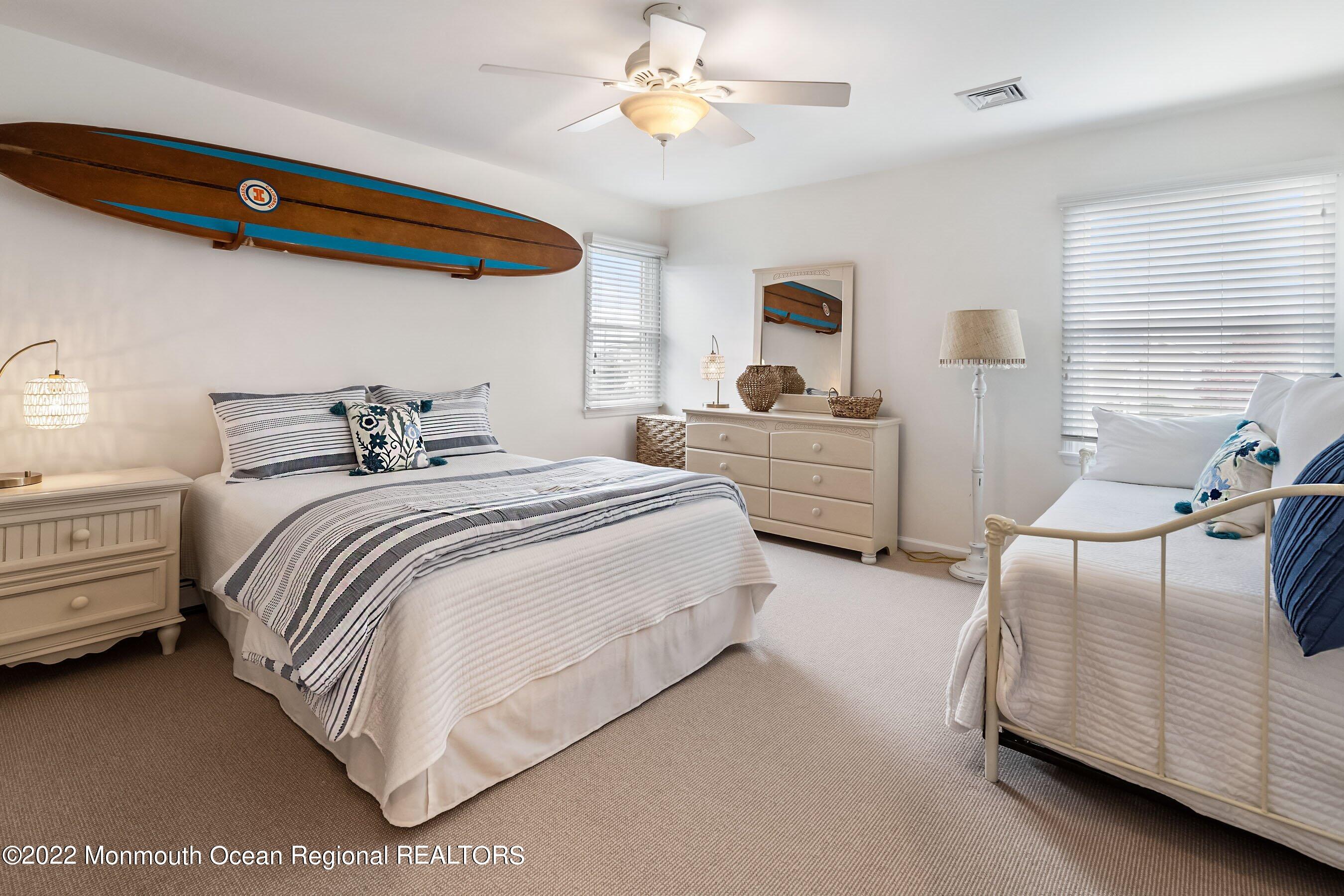 23 Magee Avenue, Unit SUMMER Lavallette, NJ 08735 - Photo 18 of 34 a bedroom with bed and window