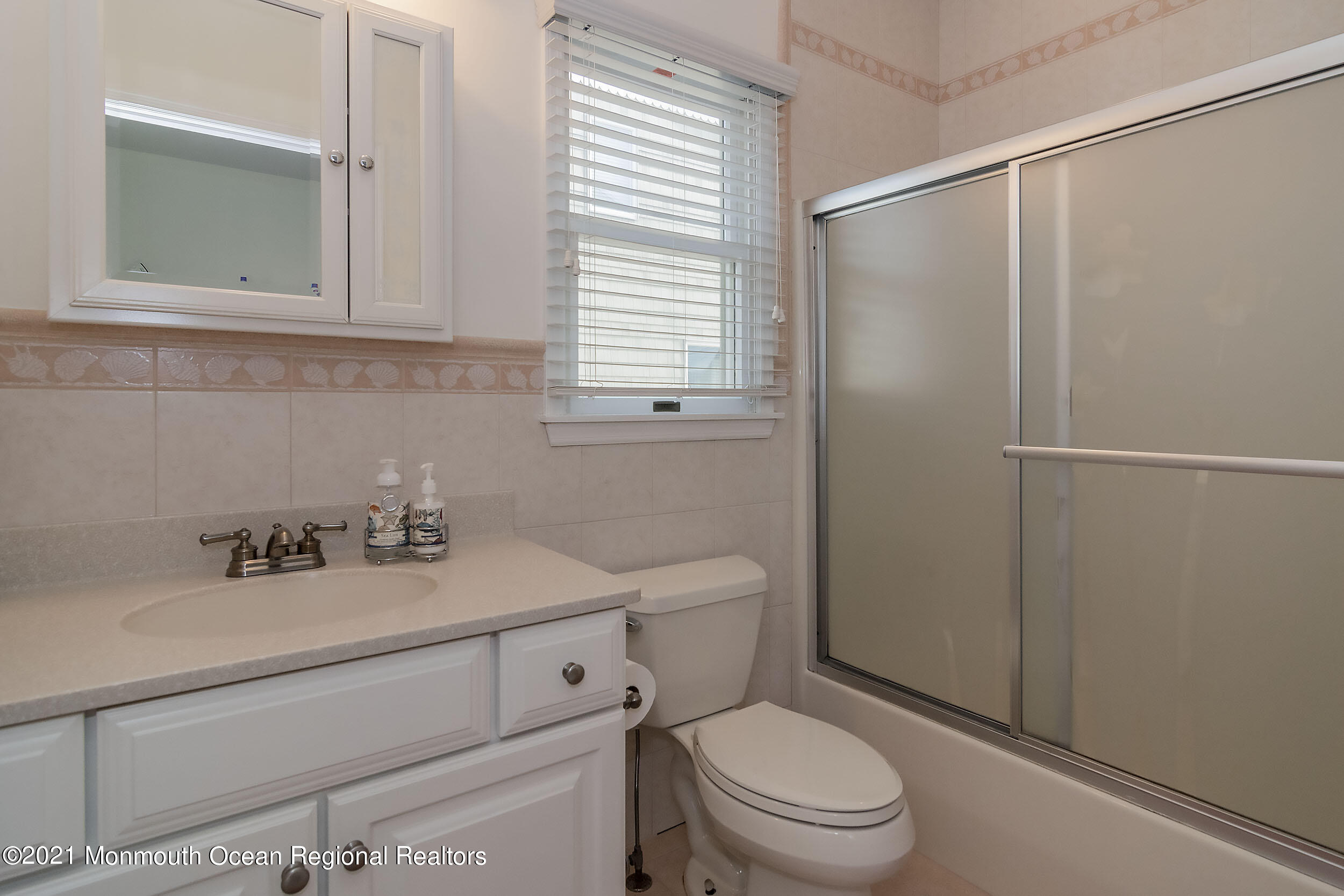 23 Magee Avenue, Unit SUMMER Lavallette, NJ 08735 - Photo 23 of 34 a bathroom with a sink toilet and shower