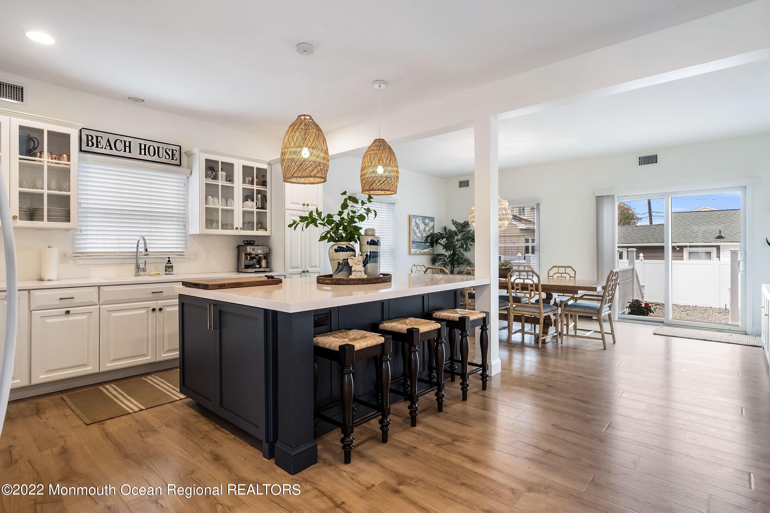 23 Magee Avenue, Unit SUMMER Lavallette, NJ 08735 - Photo 6 of 34 a kitchen with lots of counter top space and dining table
