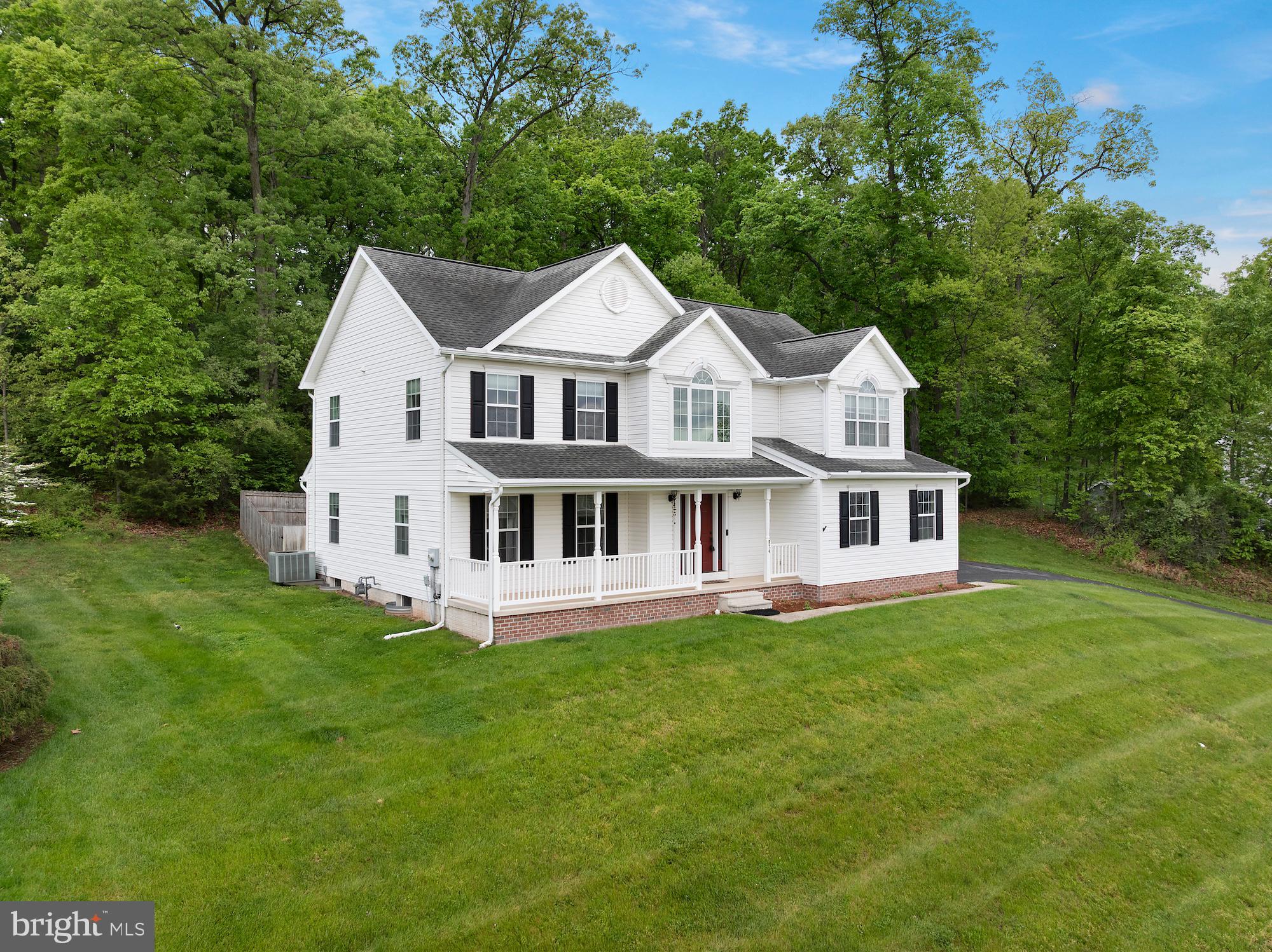 Charming home nestled in lush greenery.