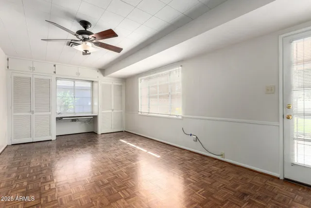 a view of an empty room with a window