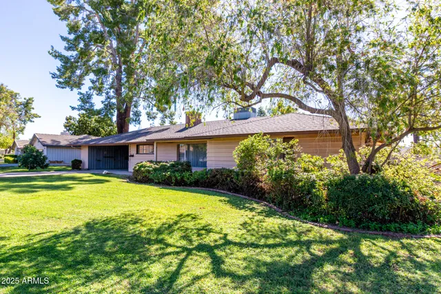 a view of a house with swimming pool