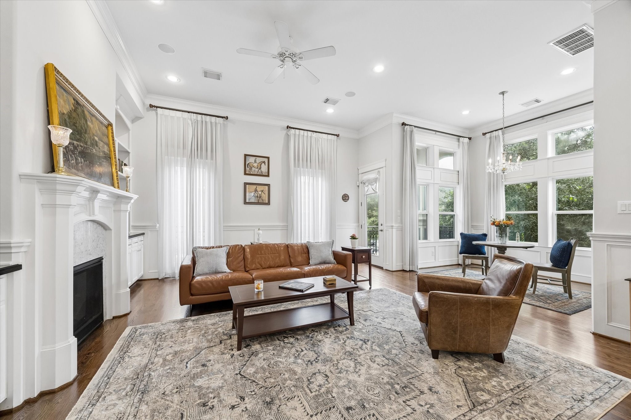 609 Rutland Street, Unit A Houston, TX 77007 - Photo 5 of 30 a living room with furniture and a fireplace