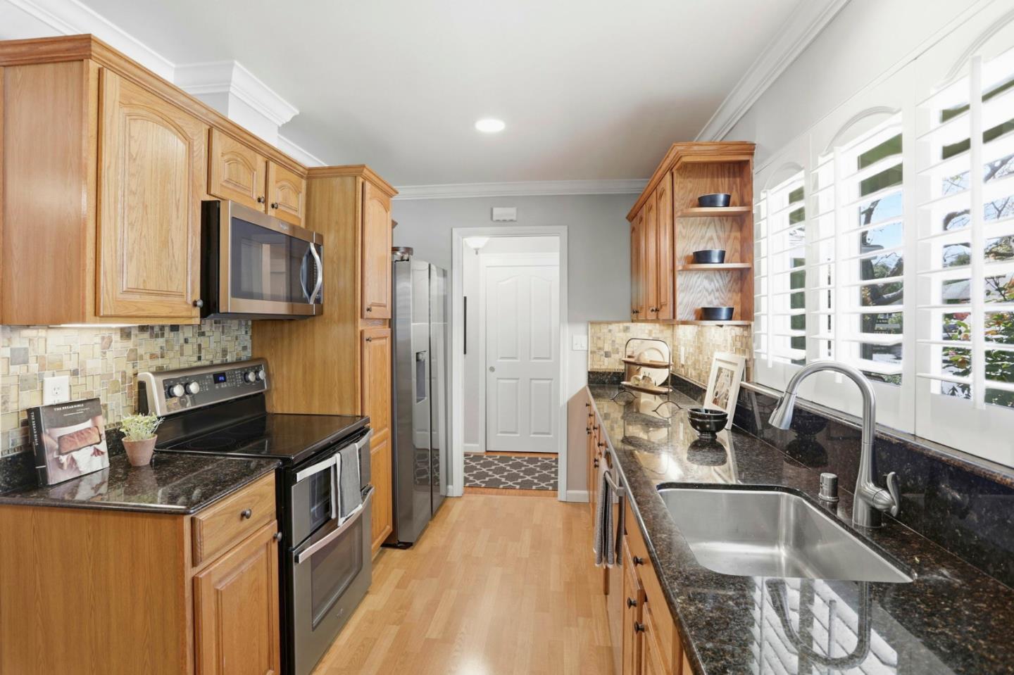 1701 Springer Road Mountain View, CA 94040 - Photo 12 of 48 a kitchen with a sink stove and refrigerator