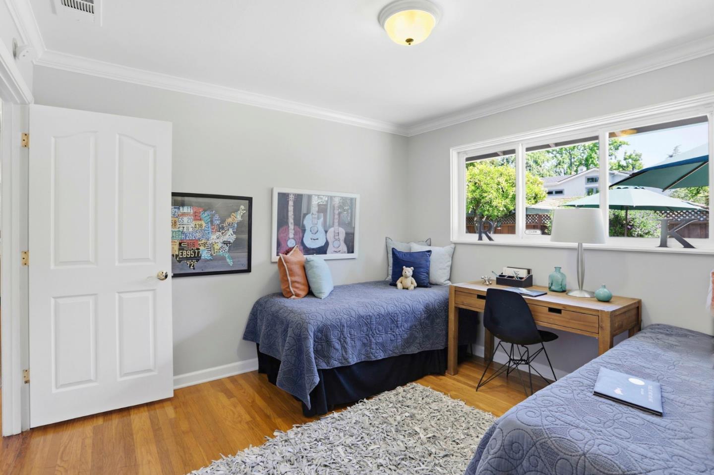 1701 Springer Road Mountain View, CA 94040 - Photo 21 of 48 a bedroom with bed and a window