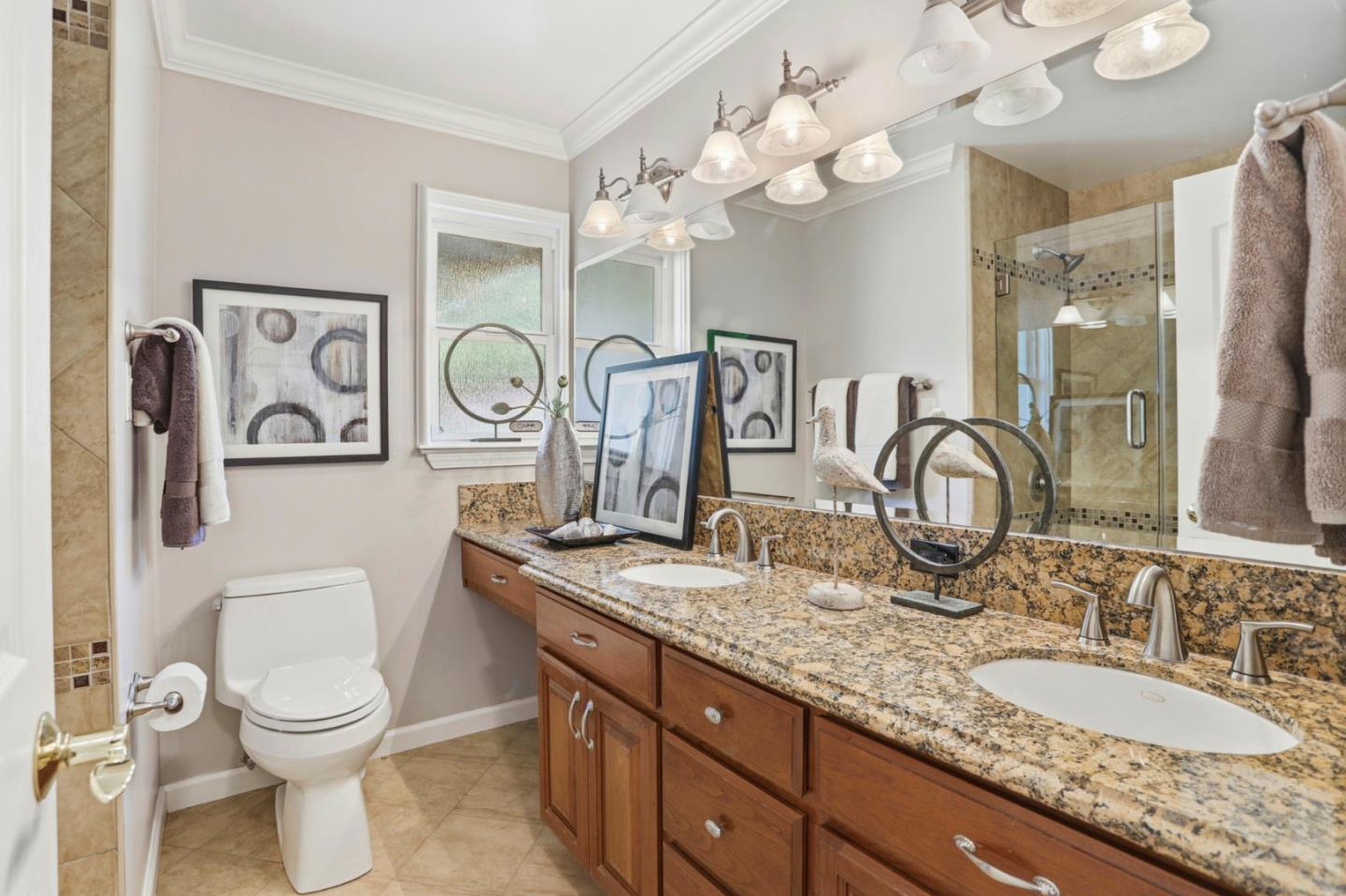 1701 Springer Road Mountain View, CA 94040 - Photo 24 of 48 a bathroom with a granite countertop double vanity sink mirror and toilet