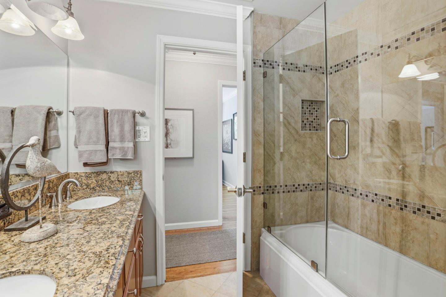 1701 Springer Road Mountain View, CA 94040 - Photo 25 of 48 a bathroom with a bathtub and a shower