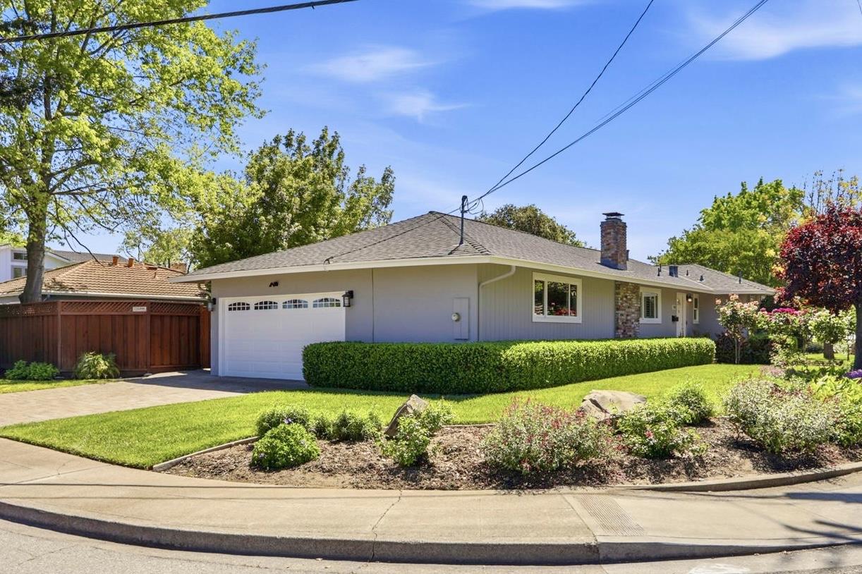 1701 Springer Road Mountain View, CA 94040 - Photo 3 of 48 a front view of a house with garden
