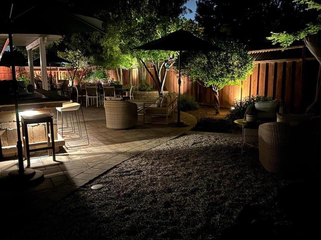 1701 Springer Road Mountain View, CA 94040 - Photo 35 of 48 a view of a chairs and table in backyard