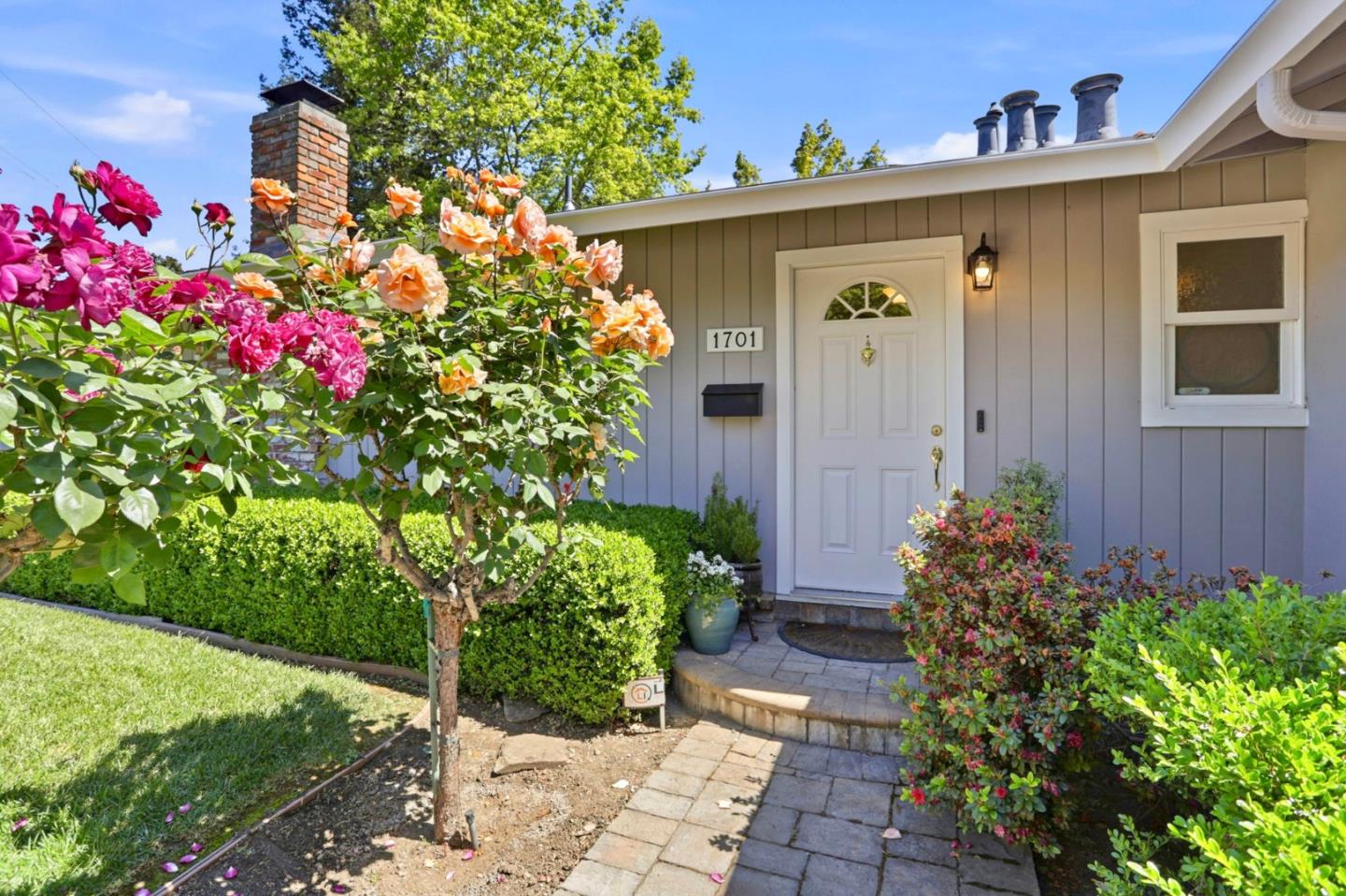 1701 Springer Road Mountain View, CA 94040 - Photo 5 of 48 a front view of a house with garden