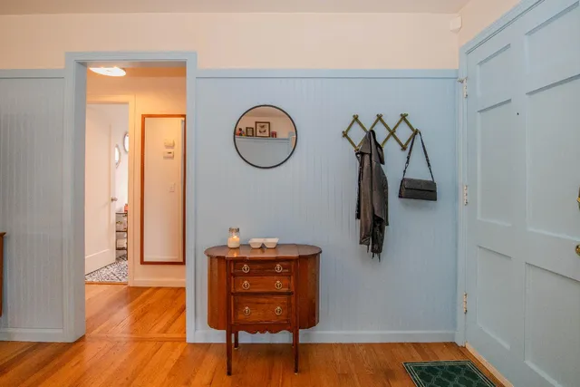 a view of room with wooden floor