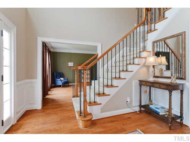 4216 Oakthorne Way Raleigh, NC 27613 - Photo 11 of 24 a view of entryway and hall with wooden floor