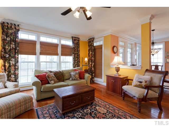 4216 Oakthorne Way Raleigh, NC 27613 - Photo 4 of 24 a living room with furniture and a window