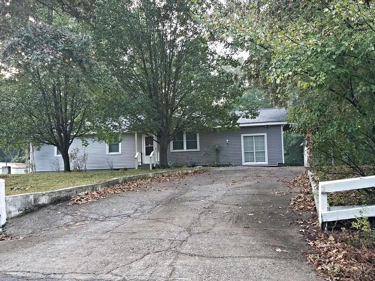 2430 Moody Road Clarksville, TN 37040 - Photo 1 of 15 a front view of a house with a yard