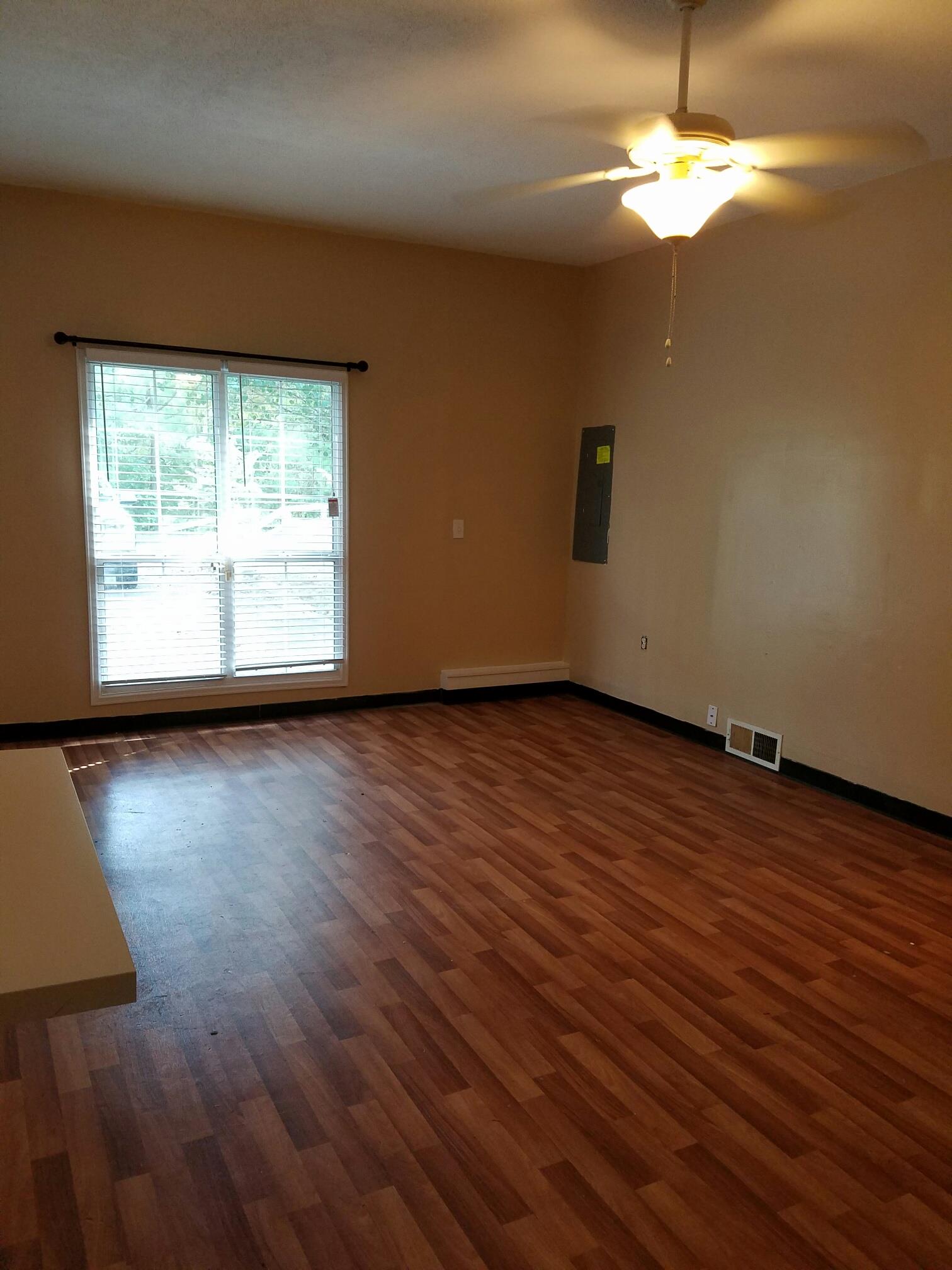2430 Moody Road Clarksville, TN 37040 - Photo 4 of 15 a view of room with window wooden floor and fan