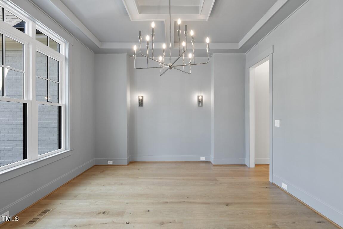 412 Vernon Terrace Raleigh, NC 27609 - Photo 15 of 67 a view of a chandelier in a room