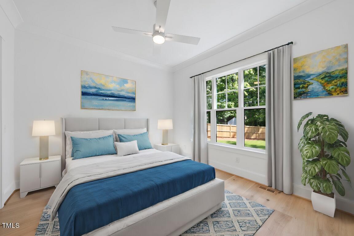 412 Vernon Terrace Raleigh, NC 27609 - Photo 29 of 67 a bedroom with a bed and a window