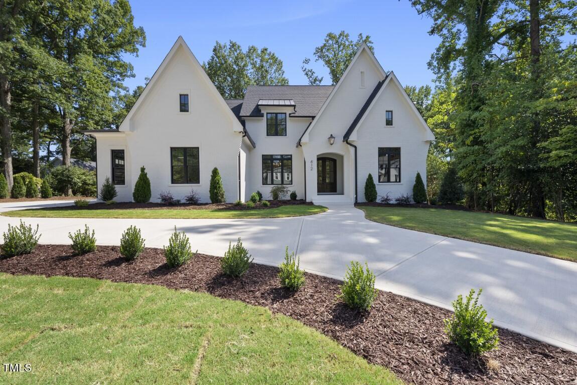 412 Vernon Terrace Raleigh, NC 27609 - Photo 3 of 67 a view of house with a yard