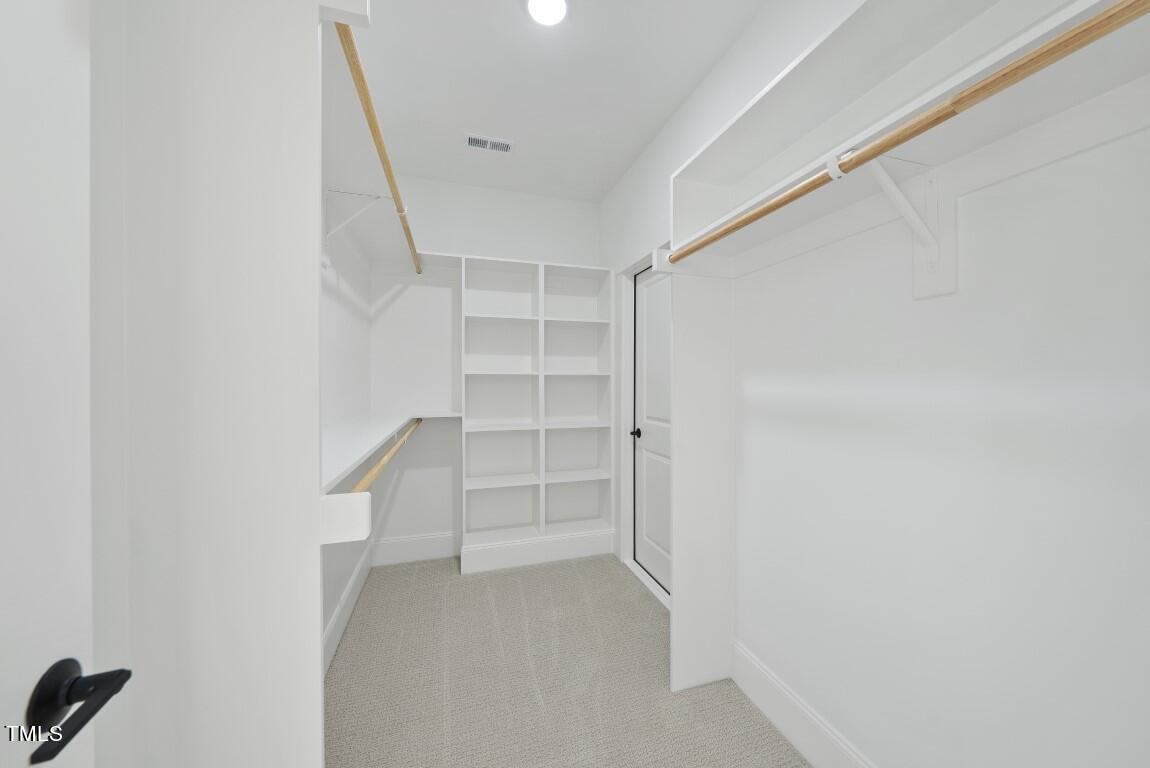412 Vernon Terrace Raleigh, NC 27609 - Photo 32 of 67 a view of an empty walk in closet
