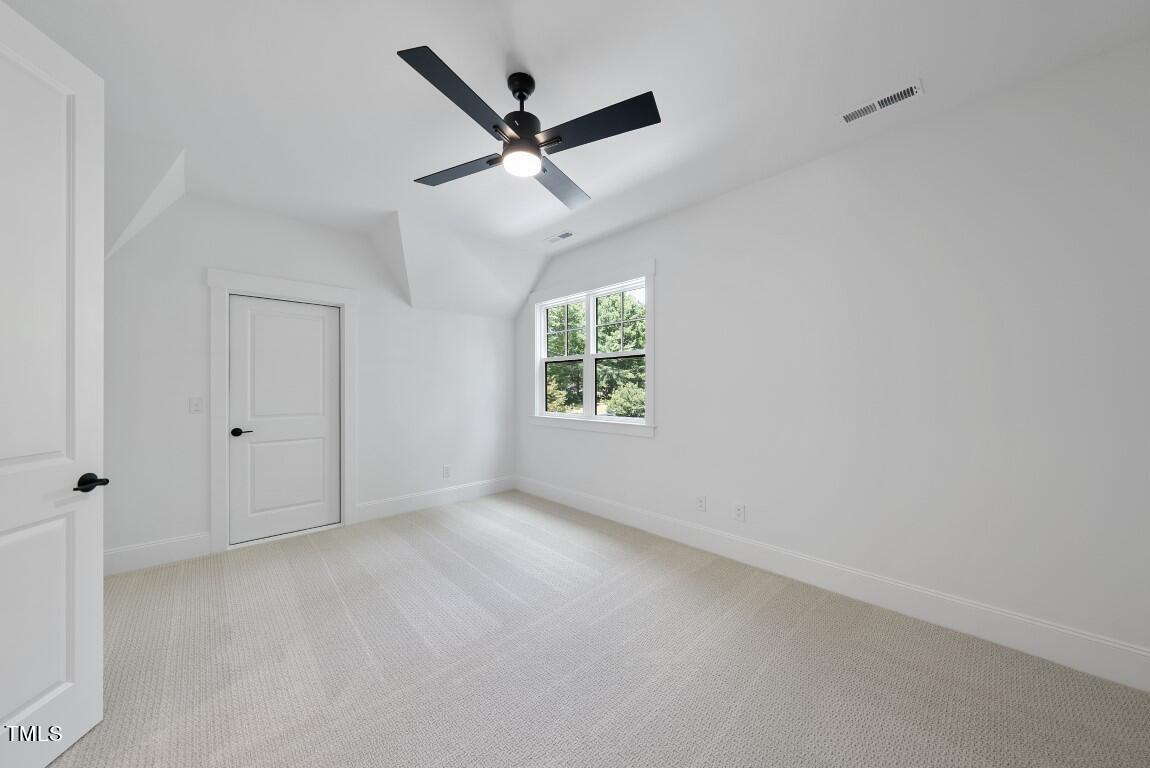 412 Vernon Terrace Raleigh, NC 27609 - Photo 36 of 67 an empty room with windows and fan