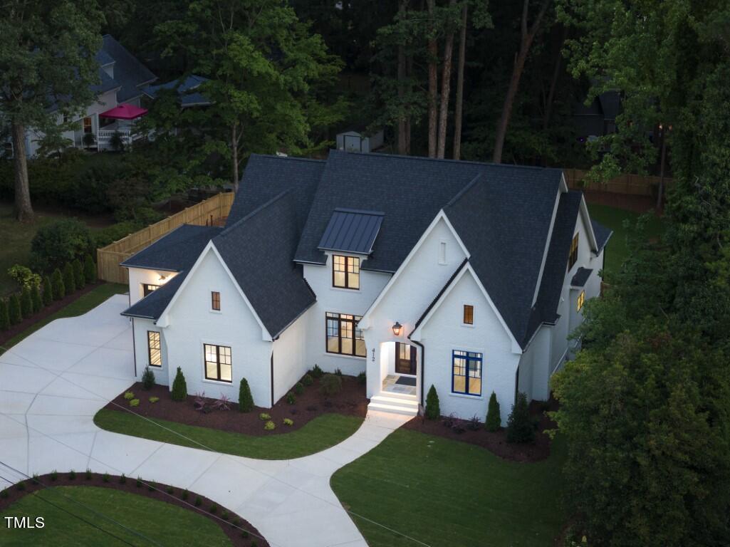 412 Vernon Terrace Raleigh, NC 27609 - Photo 61 of 67 a front view of a house with garden