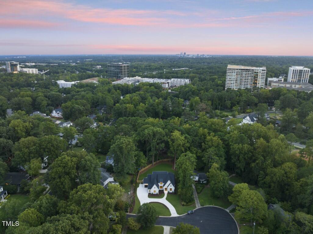 412 Vernon Terrace Raleigh, NC 27609 - Photo 65 of 67 an aerial view of a house with a yard and lake view