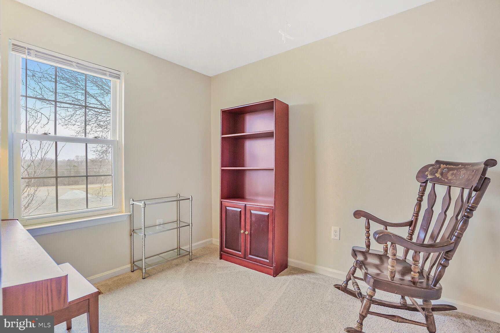 7810 Gateshead Lane Manassas, VA 20109 - Photo 15 of 20 a view of livingroom with furniture and a window
