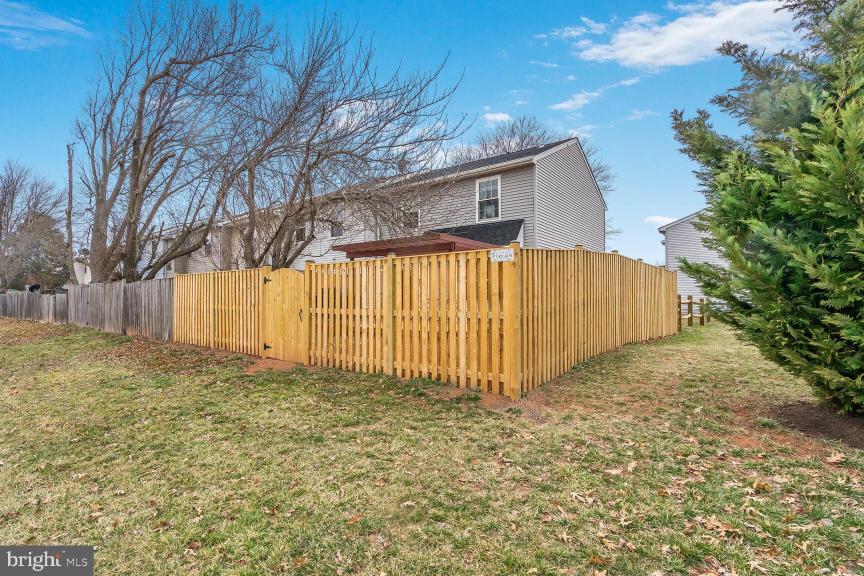 7810 Gateshead Lane Manassas, VA 20109 - Photo 19 of 20 a view of a backyard