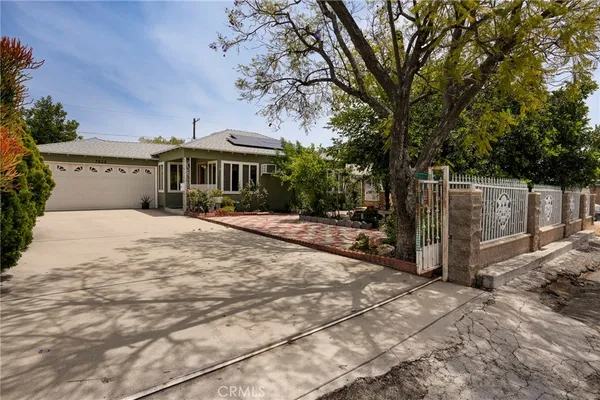 a view of house with a outdoor space