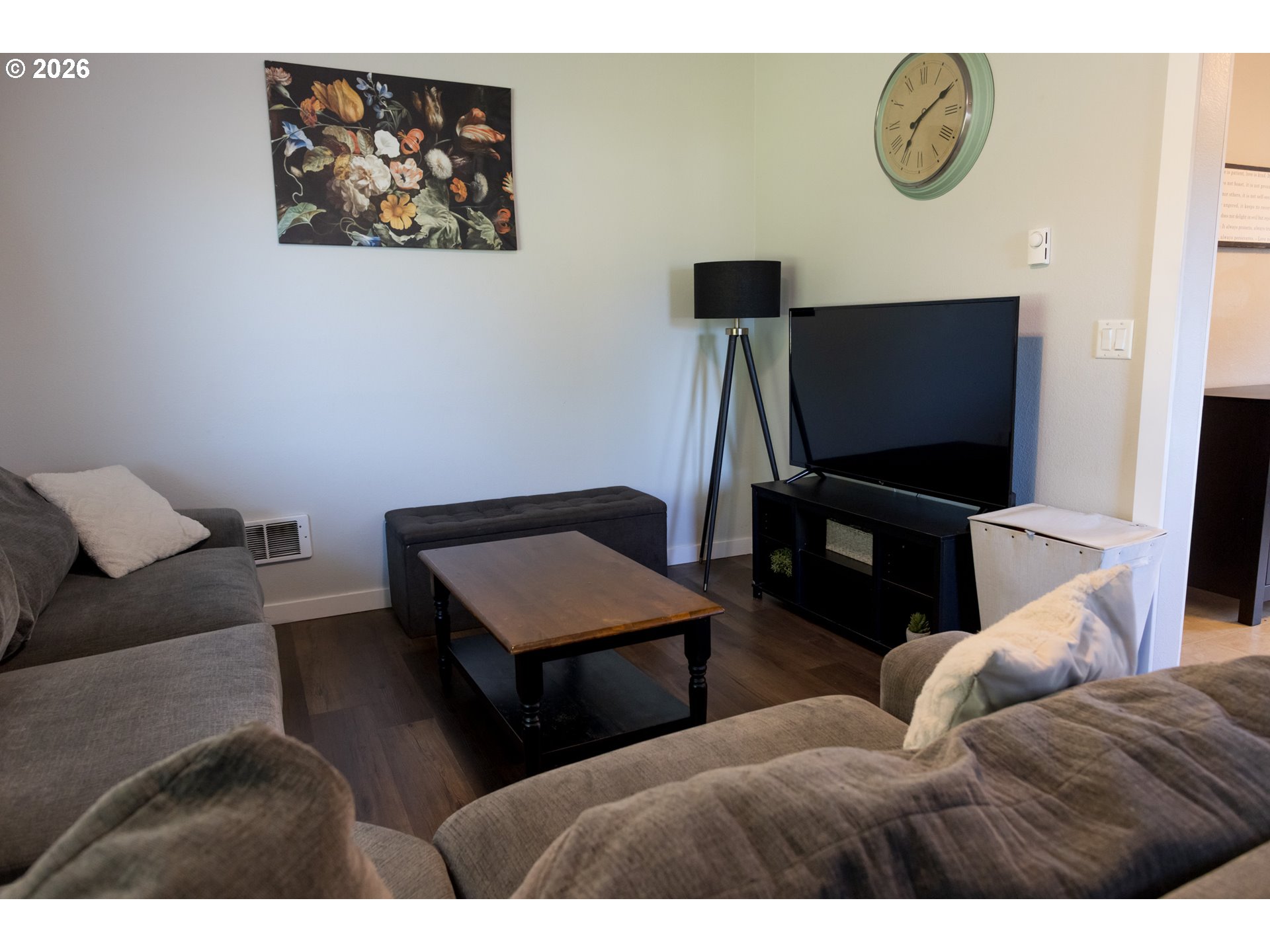 420 Juniper Street Florence, OR 97439 - Photo 16 of 34 a living room with furniture and a flat screen tv
