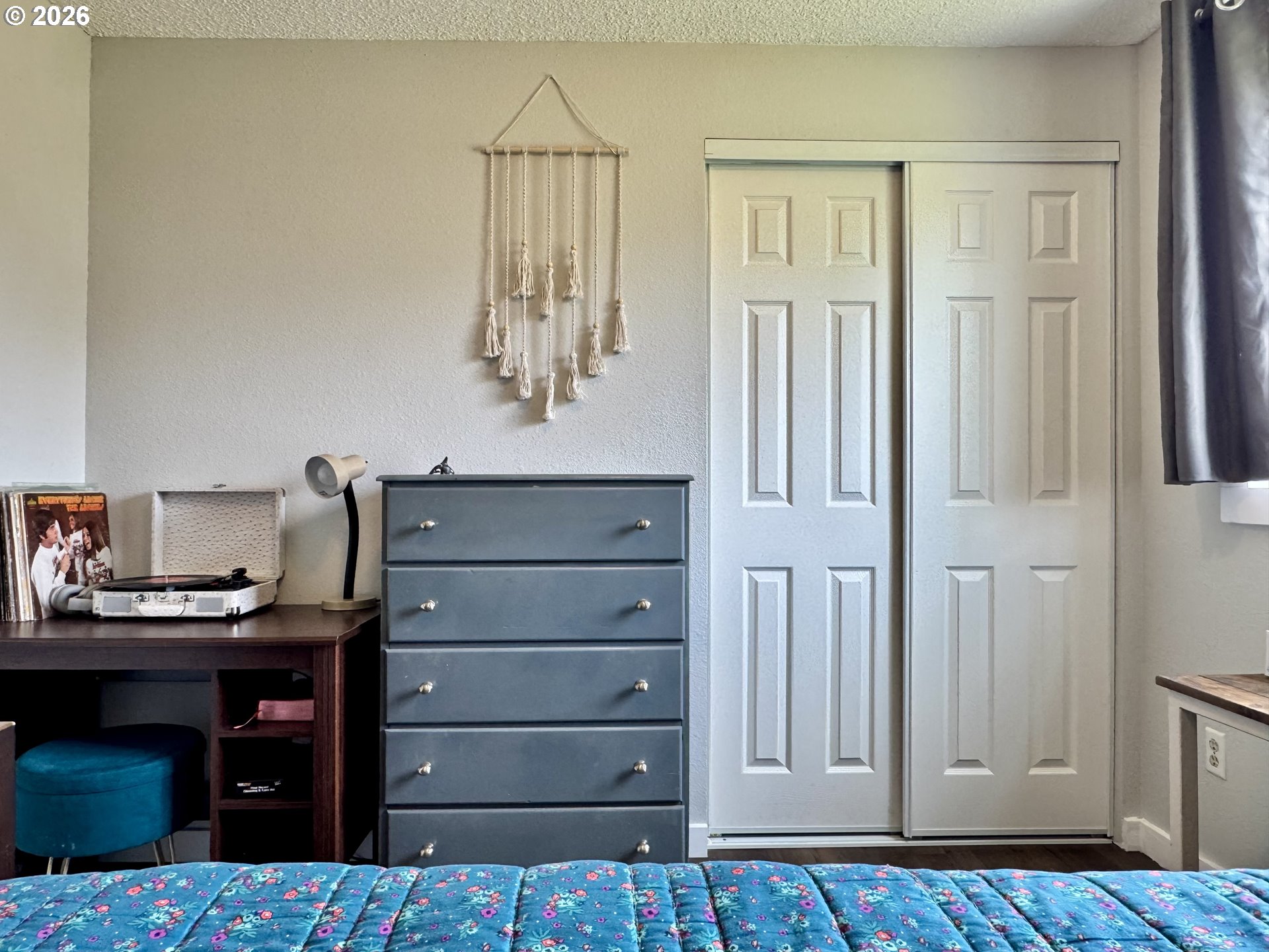 420 Juniper Street Florence, OR 97439 - Photo 21 of 34 a room with a dresser and a window