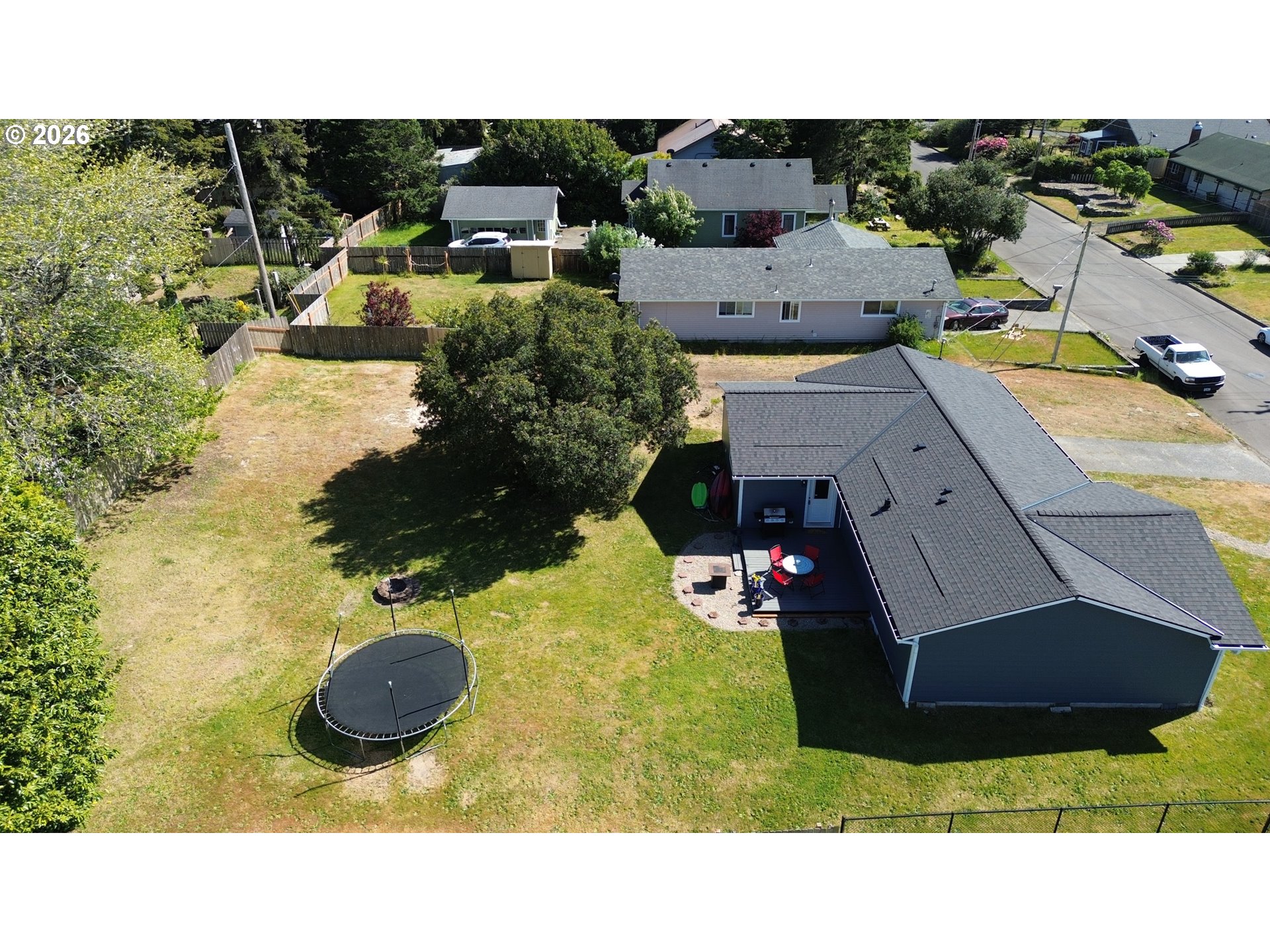 420 Juniper Street Florence, OR 97439 - Photo 31 of 34 a view of a house with a swimming pool