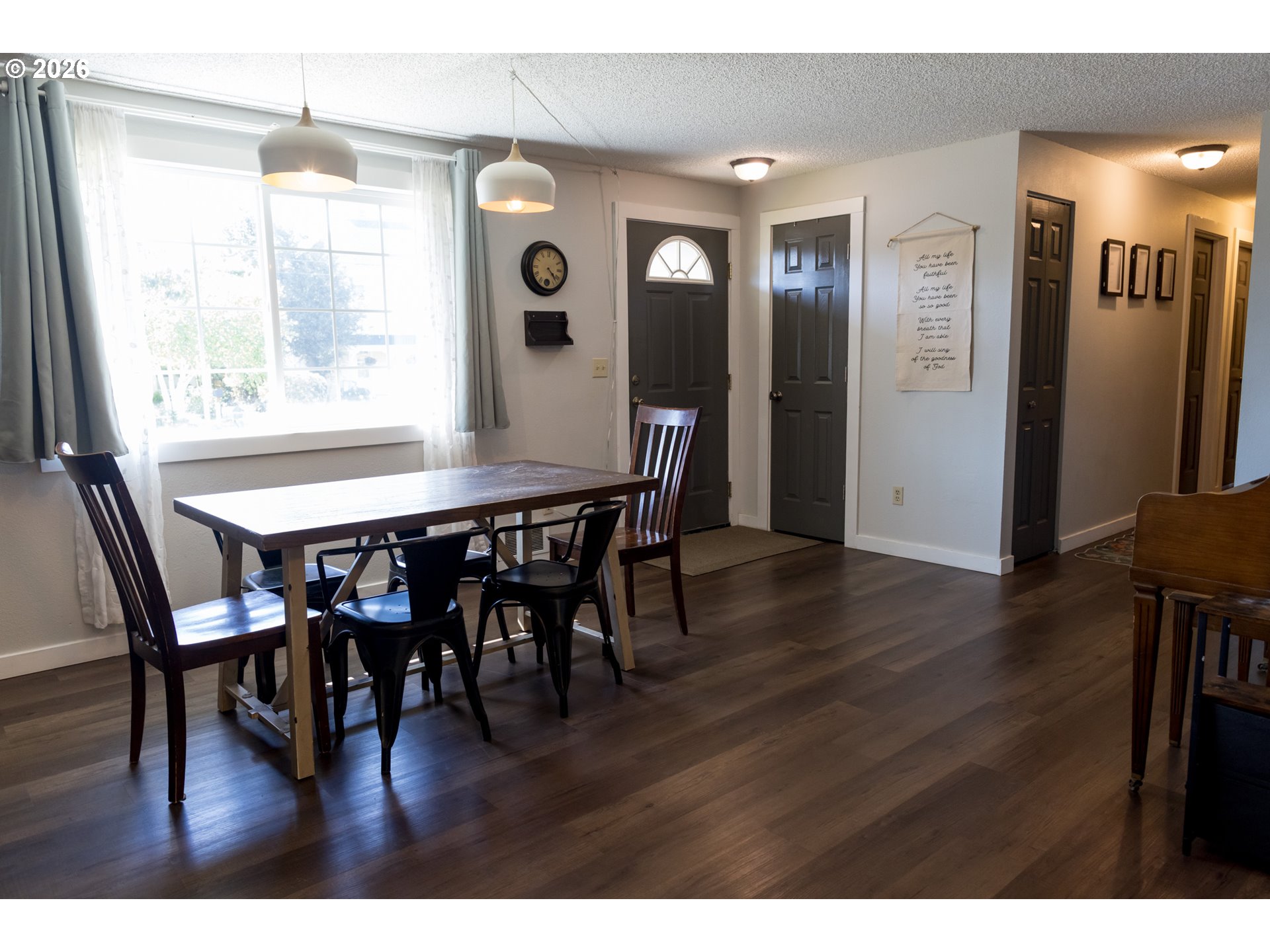 420 Juniper Street Florence, OR 97439 - Photo 7 of 34 a view of a dining room with furniture and wooden floor