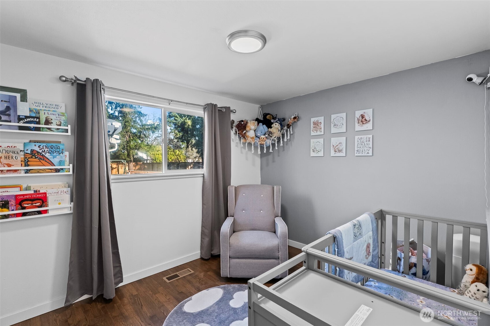 8809 Meadow Road Southwest Lakewood, WA 98499 - Photo 15 of 33 a living room with furniture and a window