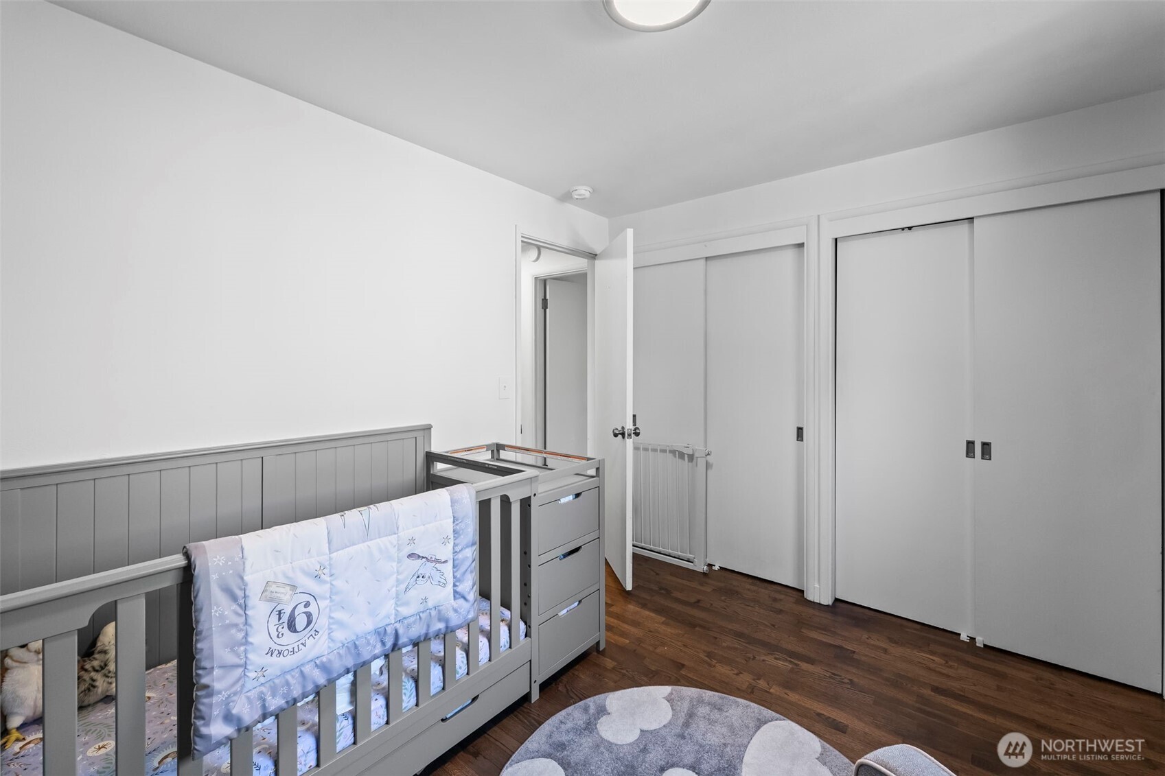 8809 Meadow Road Southwest Lakewood, WA 98499 - Photo 16 of 33 a bedroom with a bed and a window