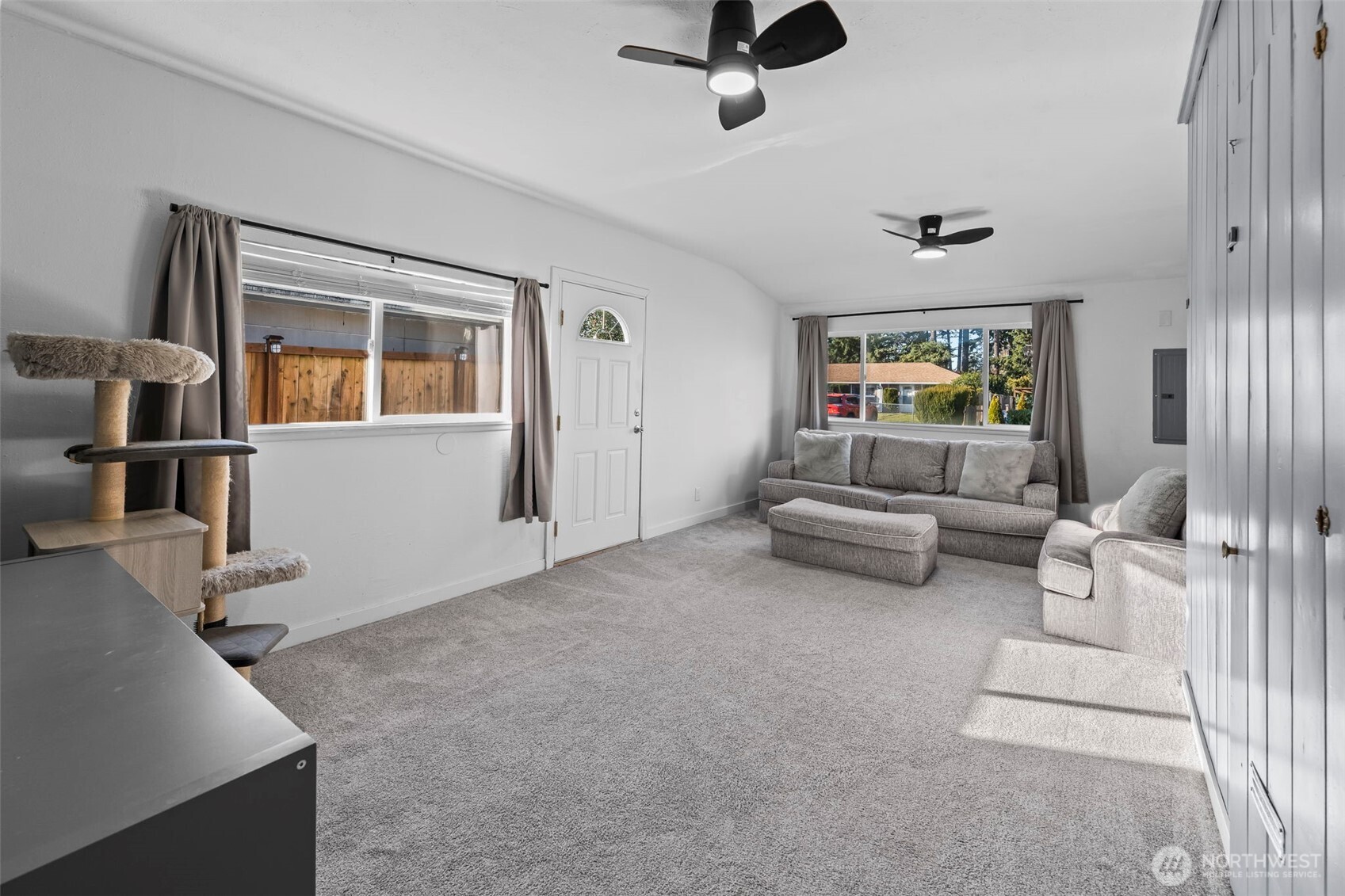 8809 Meadow Road Southwest Lakewood, WA 98499 - Photo 17 of 33 a living room with furniture and a ceiling fan
