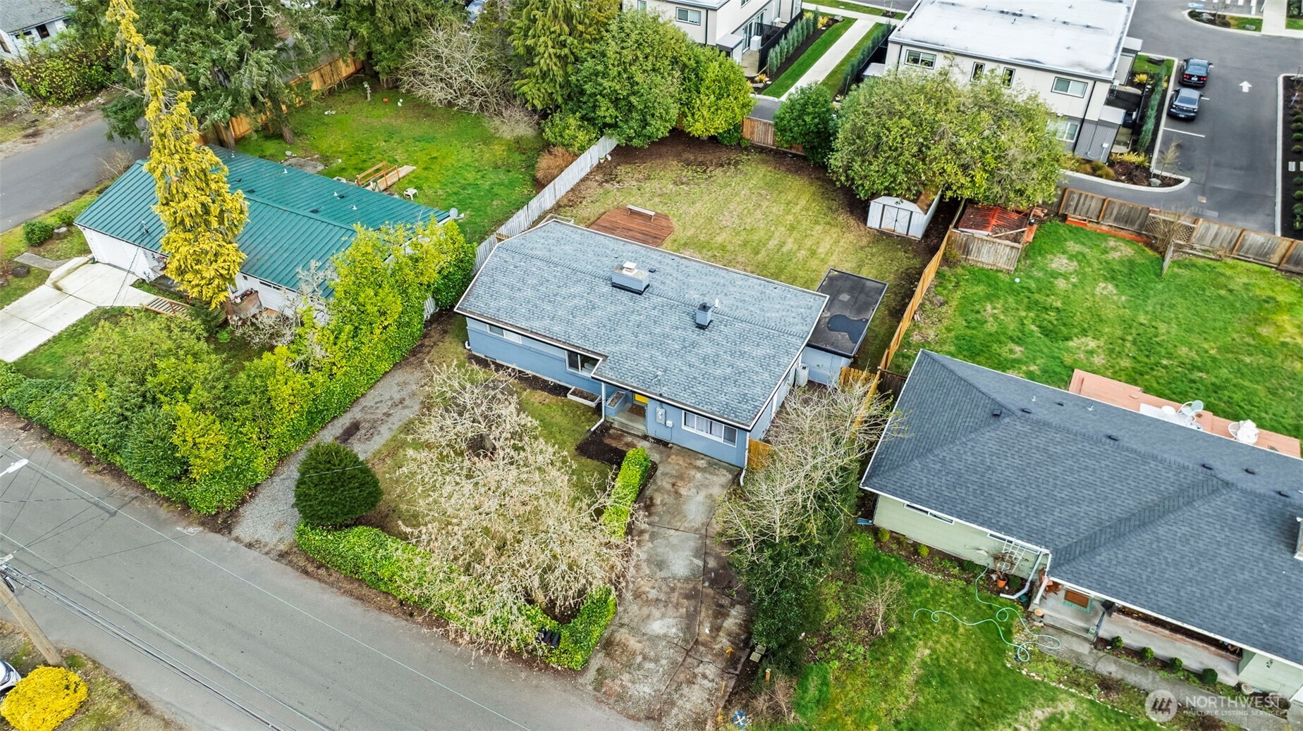 8809 Meadow Road Southwest Lakewood, WA 98499 - Photo 25 of 33 an aerial view of a house with garden space and street view