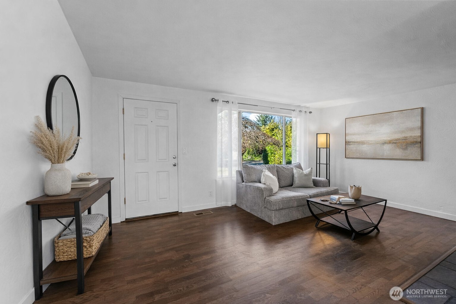 8809 Meadow Road Southwest Lakewood, WA 98499 - Photo 4 of 33 a living room with furniture and a window