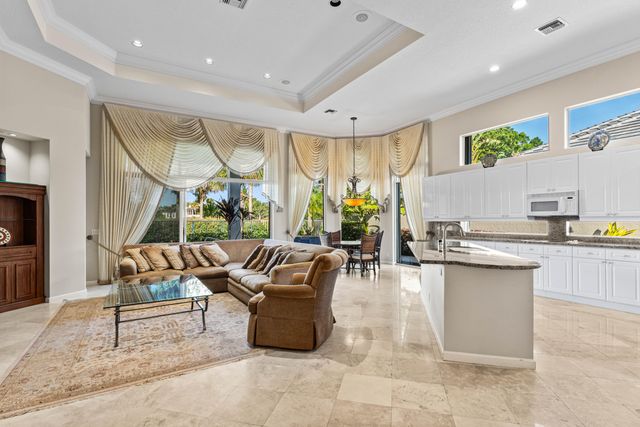 a bedroom with a bed and a television