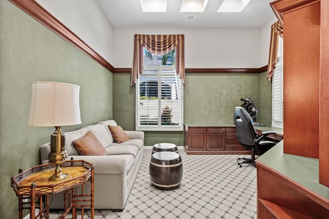a view of a patio with a table and chairs
