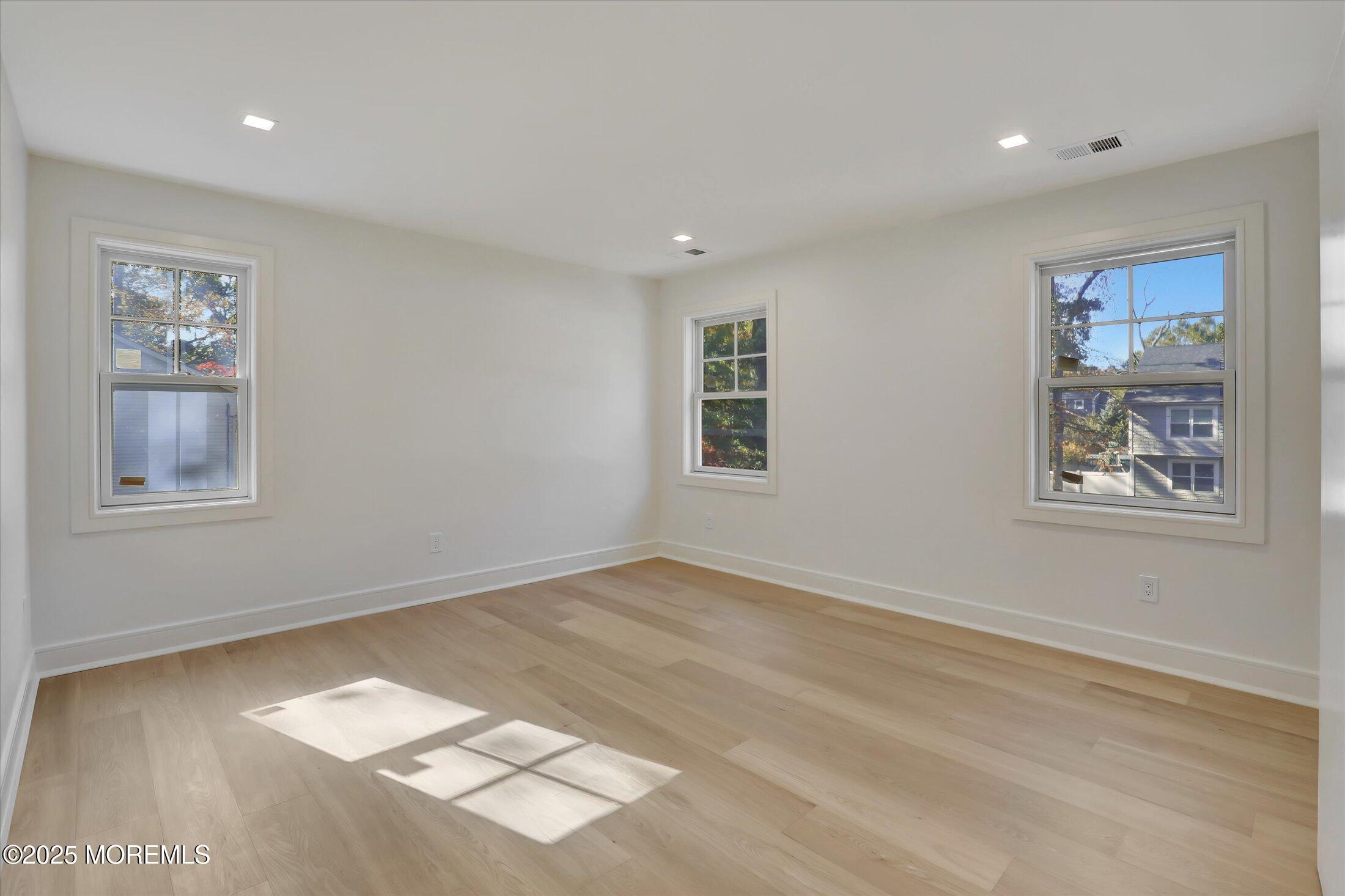 243 Woodcrest Road Oakhurst, NJ 07755 - Photo 27 of 42 a view of an empty room with a window