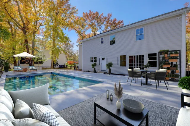 a view of backyard with green space