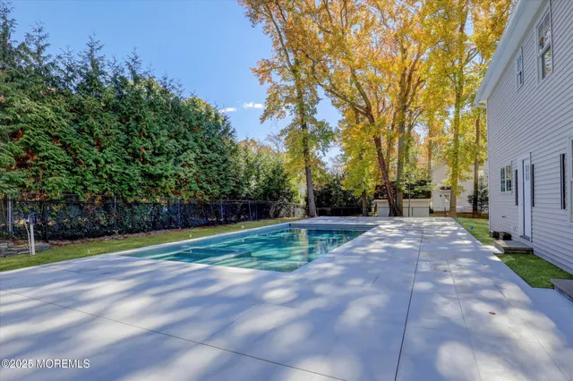 a kitchen with a sink stove and refrigerator