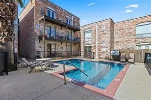 a view of a building with sitting area