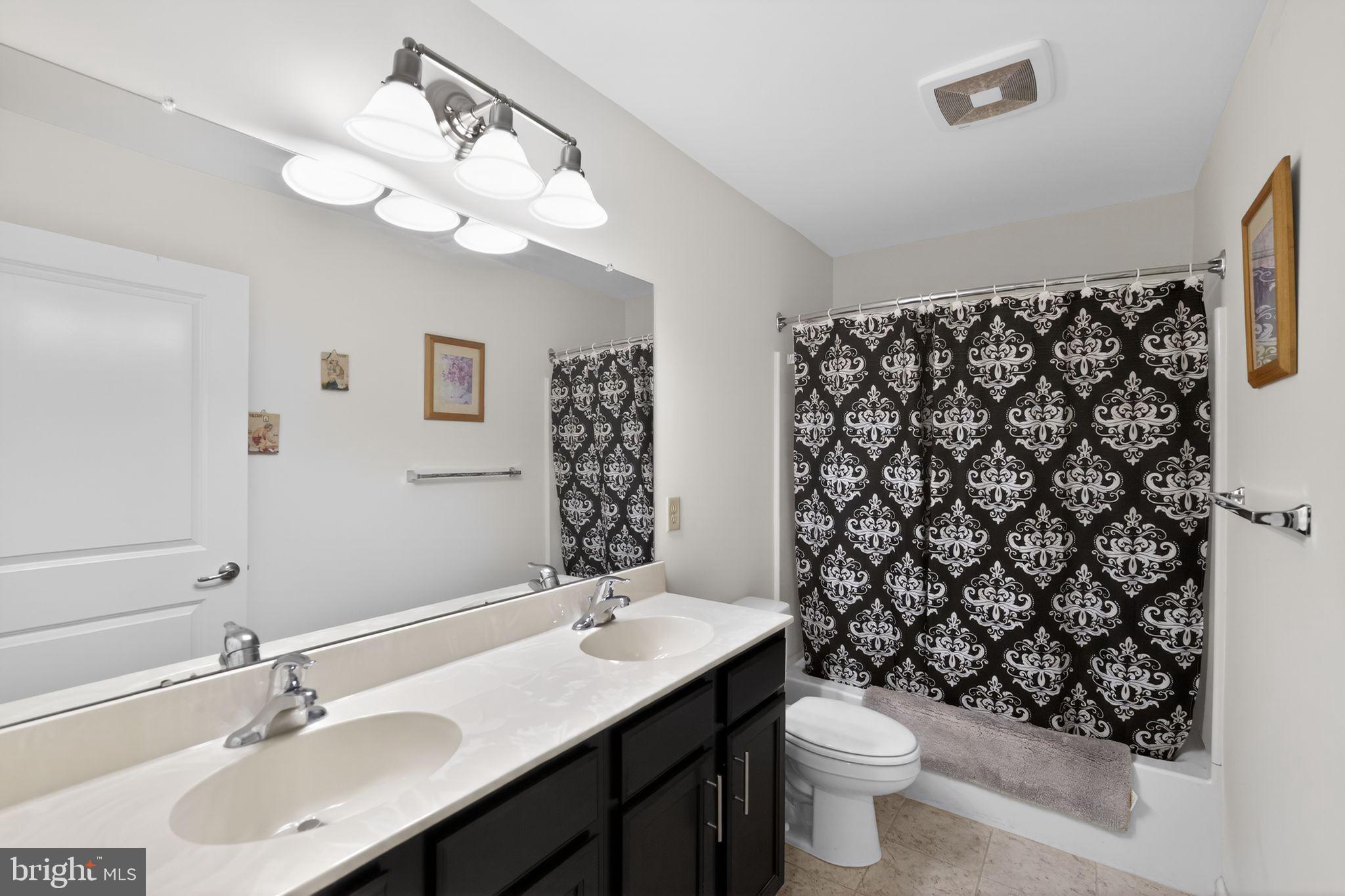 33 Rowand Way East Clementon, NJ 08021 - Photo 12 of 15 a bathroom with a sink vanity mirror and toilet